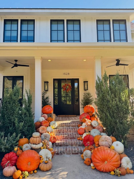 A welcoming home entrance decorated for autumn